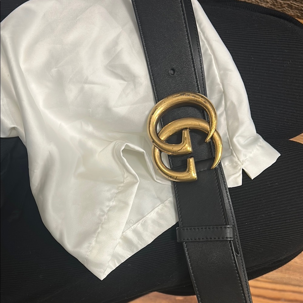 Gucci Black and Gold Leather Belt with Iconic GG Buckle